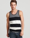 An exciting graphic stripe pattern defines this soft cotton tank from ALTERNATIVE, perfect for trips to the shore or hanging out back on warm weather evenings.