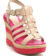 Hot pink stripes race around the wedge heel of Aqua's Delhi espadrille, paired with a caged vamp in neutral nude leather.