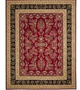 Safavieh's Lyndhurst collection offers the beauty and painstaking detail of traditional Persian and European styles with the ease of polypropylene. With a symphony of florals, vines and latticework detailing, these beautiful rugs bring warmth and life to any room. Polypropylene resists stains, keeping rugs pristine for years to come. Step into a labyrnthine garden where shapes, colors and ornate detailing weave together to create an enchanted tableau. This rug features a dramatic black border with a bold red interior. (Clearance)