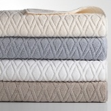 Luxuriously soft and absorbent, this collection of Cross Diamond towels are made from plush, Turkish cotton. Coordinates with Hudson Park solid color rugs, premier towels and shower curtains.