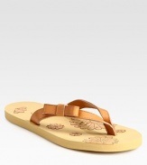 Comfy, floral-printed foam footbed adds charm to this leather thong design. Leather upperCork and foam liningFoam soleMade in ItalyOUR FIT MODEL RECOMMENDS ordering true size. 