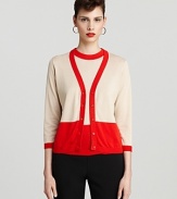 Channel mod-chic in this color block kate spade new york cardigan. Play up the vibrant hue with a bold red lip for a look brimming with retro appeal.