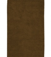 Step into ultimate softness with this opulent area rug, hand-woven with sumptuous New Zealand felted wool. In warm brown tone, this lush piece fits both traditional and contemporary decor.