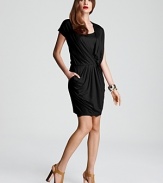 Fluid draping lends elegant dimension to this standout DKNY dress. Garnish with gold accents and step into the spotlight.