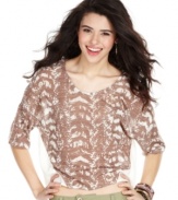A splatter of print lends abstract cool to this comfy, dropped shoulder top from Fire! For a look that boasts safari style, pair the top with earth-toned bottoms!