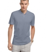 The soft, silky feel of this polo shirt from Calvin Klein adds a luxurious detail to the classic shirt. (Clearance)