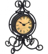 Wrought iron is elegantly twisted around this timepiece, gracing your tabletop with traditional grandeur. With an antique dial and bold Roman numerals, this clock evokes another time and place.