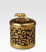 A candle with the invigorating scent of Vetiver D'Orient, encased in a cylinder of fine Limoges porcelain with golden leopard spots. Includes a fitted lid sculpted from 14k gold in the shape of a leopard. Handcrafted porcelain 4¾H X 5 diam. Imported 