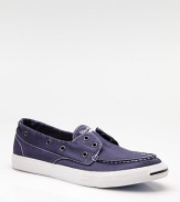 A super-casual spin on the classic boat shoe, now in washed cotton twill with a laceless, slip-on design. Metal rivets Padded insole Rubber sole Imported 
