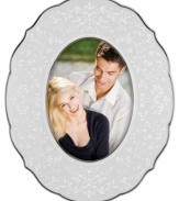 With the delicate vines and raised dots of the Lenox fine china collection, this Opal Innocence picture frame offers a look of classic elegance in platinum-banded porcelain. Qualifies for Rebate