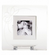The luminous, ribbon-like motif of the Belle Boulevard collection nestles at the corner of this picture frame. Timeless and elegant, it's the perfect way to memorialize your finest moments.