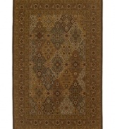 A traditional panel design is woven of supreme New Zealand wool in the Ellsworth area rug in antique tones of mocha, brown, celadon and beige for a truly rich addition to old-world interiors.