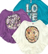 Keep her feeling groovy in one of these sparkly graphic shirts from Beautees.