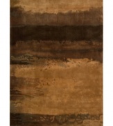 Richly textured, Calvin Klein's collection of luster-washed rugs bring an element of earthy, modern luxury to your home. The copper rug is handcrafted of plush wool in russet and coffee tones and finished with a special wash to produce an elegant patina.