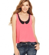 Mesh insets create a faux peter pan collar on a top that boasts 100% authentically cute style! From Material Girl.