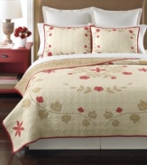 A smattering of fanciful florals and leaves sits upon a landscape of quilted beauty in this Cabin Flowers quilt from Martha Stewart Collection. A touch of classic red offers a charming touch.