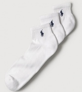 Polo Ralph Lauren set of three stretch cotton quarter socks feature a cushioned foot and ribbed top. Polo player embroidered detail. Three pairs of socks per set.