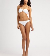 Sexy bandeau top with dazzling gold center for a beach ready look. Padded bandeau topBack tie closureFully lined75% polyamide/25% spandexHand washImported Please note: Bikini bottom sold separately.