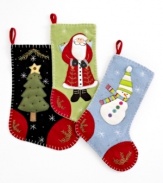 Full of personality, these crafty Christmas stockings from Jabara are sewn with beads, buttons and whimsical whipstitch motifs, including a tree, Santa and snowman.