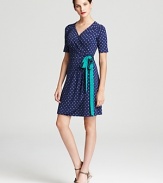 Dainty polka dots dance across this Lilly Pulitzer wrap dress, finished with a contrast belt for a playful yet polished approach to everyday style.