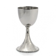 An elegant addition to holidays and Friday night dinners, this Kiddush cup possesses timeless beauty. In the designer's own words, the Molten collection is distinguished by streamlined, timeless shapes... objects which reverberate with the skill of their maker and yet do not fit into a traditional interpretation of craft. The pieces possess a soulfulness and organic energy only possible through the handmade process. An elegant addition to holidays and Friday night dinners, this Kiddush cup possesses timeless beauty. In the designer's own words, the Molten collection is distinguished by streamlined, timeless shapes... objects which reverberate with the skill of their maker and yet do not fit into a traditional interpretation of craft. The pieces possess a soulfulness and organic energy only possible through the handmade process.