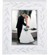 Put your most elegant photos on display with the Opal Innocence picture frame from Lenox. A delicate vine motif etched in crystal makes cherished memories shine. A beautiful wedding gift! Qualifies for Rebate