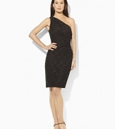 A glamorous one-shoulder sheath dress is rendered in ultra-soft matte jersey with a hint of stretch and shirring at the waist for an alluring, modern look.