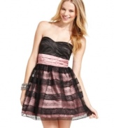 Stark color contrast and a lace-adorned tulle overlay give this party princess dress a bit of edge! From Trixxi.