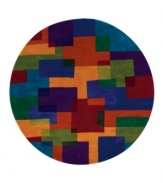 This round rug is ideal for open spaces. A dynamic mix of bright colors and geometric shapes creates an arresting rug that recalls the best of modern art. The color palette of blue, red, salmon, yellow and sage gives the piece a vibrant, buoyant style that lends your home a striking, contemporary look.