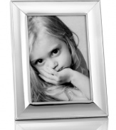 Classic good looks. The Concave picture frame lends timeless style to memorable moments, with an elegant silver-plated edge by Martha Stewart Collection.
