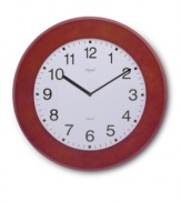 Get the skinny with this stylish wall clock from Opal Clocks. A slim-profile design in dark wood with a white, numbered dial complements any setting, from kitchens to kids' rooms.