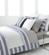 Redefine the look of your bedroom with these sophisticated stripes. Broad horizontal lines in vapor blue alternate with pinstripes for a studied, modern look upon rich cotton. Add a few quilted and solid Lacoste accents and you'll feel right at home with this urban bedding collection.