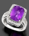 A tremendously elegant platform for the darkly romantic beauty of amethyst. In 14k white gold, this ring features cushion-cut amethyst (6 ct. t.w.) surrounded by round-cut diamond (1/5 ct. t.w.).