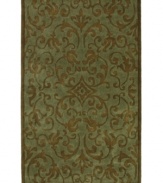 Make your home your sanctuary with this Utopia rug from Sphinx. Soft blue and chocolate hues bring life to an elegantly scrolled motif, enhancing your decor with simple, classic beauty. With an ultrasoft, lustrous finish for a blissful result.