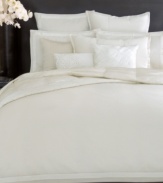 Crafted of luxe 400-thread count cotton sateen, this White Gold flat sheet from Donna Karan features chic pleating along the hem for a polished look.