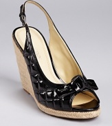 Classic quilting adorns glossy patent leather on an espadrille sandal from Enzo Angiolini.