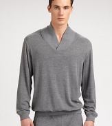 Smooth and soft, this versatile knit style can be worn at home or outdoors.Cowl neckRibbed knit collar, cuffs and hem53% polyamide/47% viscoseMachine washImported