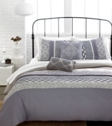 Calming comfort. In sweet and subtle hues, this Lily comforter set transforms your space into a personal retreat with a relaxed balance of printed and solid sections. Pleated accents and a pair of decorative pillows offer extra dimension to the look.