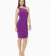The epitome of chic sophistication in a ruched one-shoulder silhouette, this dress is tailored from slinky matte jersey with draped detailing for a dramatic effect.