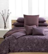 A sweet design. Wine and plum colored elements compose the Elm comforter set from Calvin Klein. A muted landscape of leaves add a touch of modern sophistication.