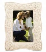Teeming with fresh blooms, the Floral Fields picture frame from Lenox has a serene, understated elegance in graceful ivory porcelain. Qualifies for Rebate