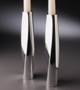 The Twist candlestick pair designed, by Fred Bould for Nambé will lend your home modern elegance. The appearance of movement and striking silhouette is achieved by the indented, curved shape on high-polished metal.