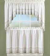 With crafted details and sweet vintage style, Abby window treatments set the scene in your kitchen for quaint country meals. The swag valances feature mini pleats, scalloped edges and delicate vines embroidered in three soothing hues.