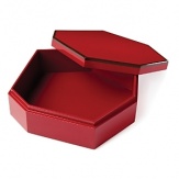 Vivid red lacquer adds a dash of drama to dressers, coffee tables and bookshelves.