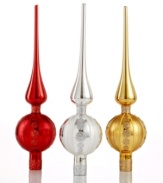 Cap off the Christmas tree with the dazzling grace of Martha Stewart Collection's glass tree topper. A finial stacked on a single ball ornament is striped with glitter and shine in red, gold or silver.