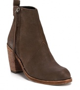 These tough-luxe little booties provide a rugged finish to fall's ladylike frocks. By Dolce Vita.