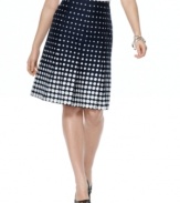 Spring into a fresh look in this fun polka dot skirt from Jones New York Signature. An A-line silhouette and allover pleats are perfect with a tee or button-down!