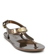 MICHAEL Michael Kors does the jelly shoe, executed in a sleek sandal silhouette with logo hardware and studded details.