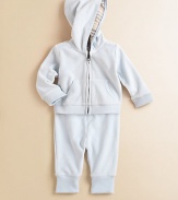 A tracksuit set tailored in classic velour features check lining at the hood.Attached hood with classic check liningZip-front styleFront kangaroo pocketMatching pants with elastic waistCottonMachine washImported