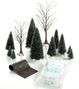 Bring the natural beauty of the season to your Christmas village with the Department 56 landscaping set. Frosted evergreens and bare-branched trees will line a cobblestone road.